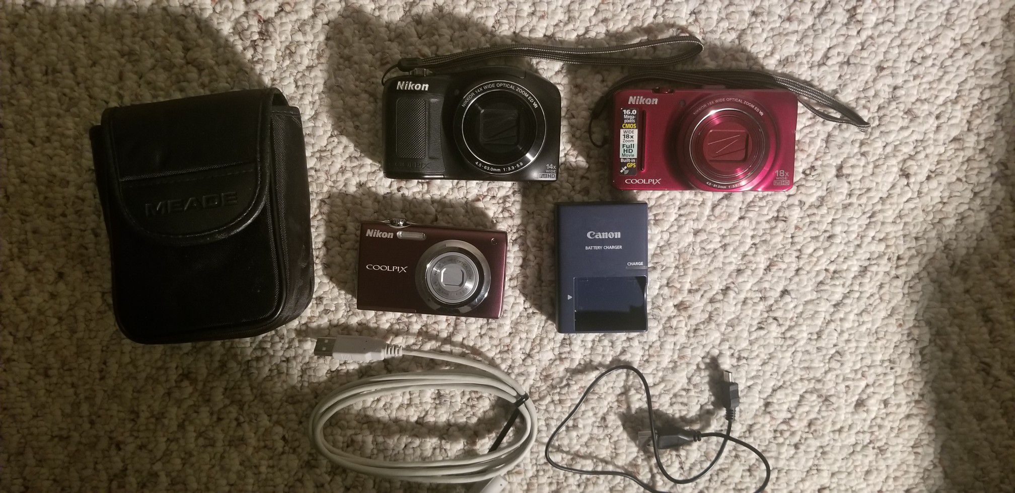 Nikon coolpix S9300, Nikon S3000 & Nikon L620 like new with charger and 8gb SD Card