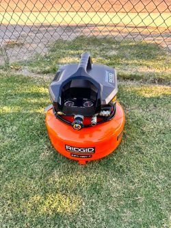 RIDGID 6 Gal. 150 PSI Portable Electric Oil-Free Jobsite Pancake Air Compressor with Dual Pressure Gauges and 2-Quick Couplers
