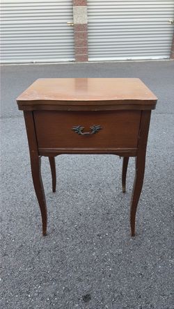 Vintage sewing machine cabinet