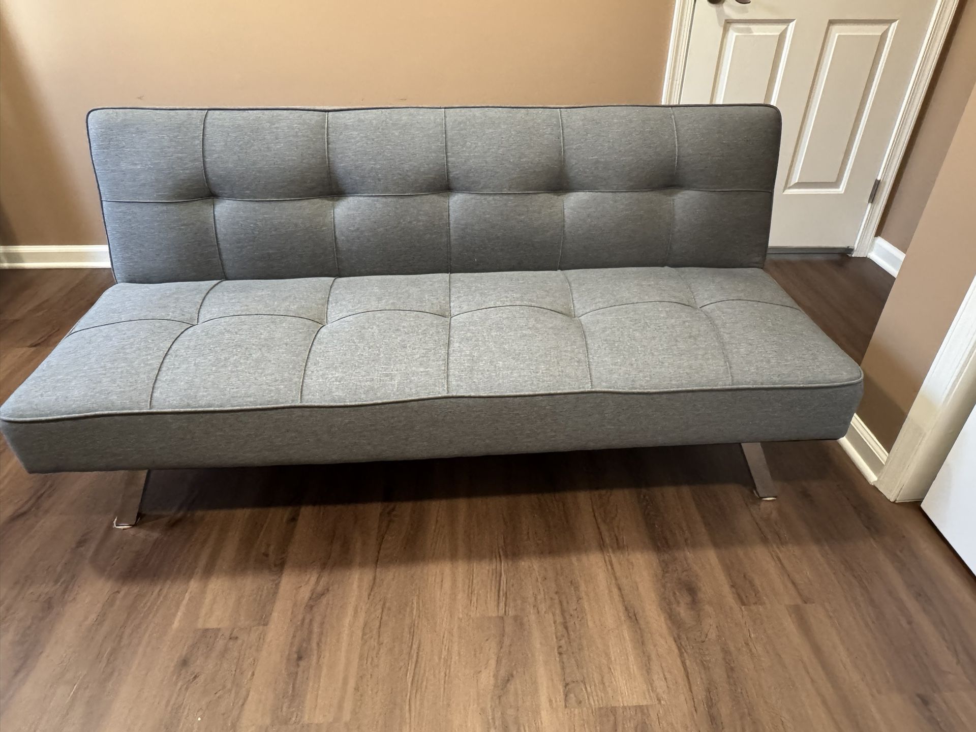 Grey fabric futon.