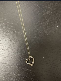 10kt heart diamond pendant 20inch long 