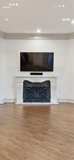 Imported Italian marble Fireplace Mantle, Hearth, and custom screen
