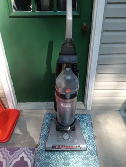 A Hoover WindTunnel high carpet vacuum
