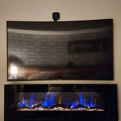 Brand NEW 60 Inch Electric Fireplace. In Box You Have Option To Use Crystals Or Log Insert Tons Of Color Variations