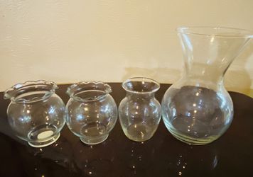 Assorted clear glass vases