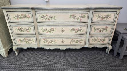 Dresser with distressed off-white finish