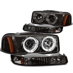 99-06 GMC Sierra 00-06 Yukon smoked housing amber reflector projector headlights
