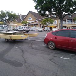 Hobie cat 14' atop Apple pop-up tent trailer.