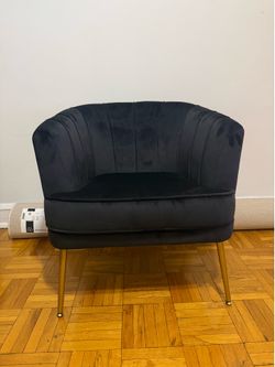 Black velvet chair with gold legs
