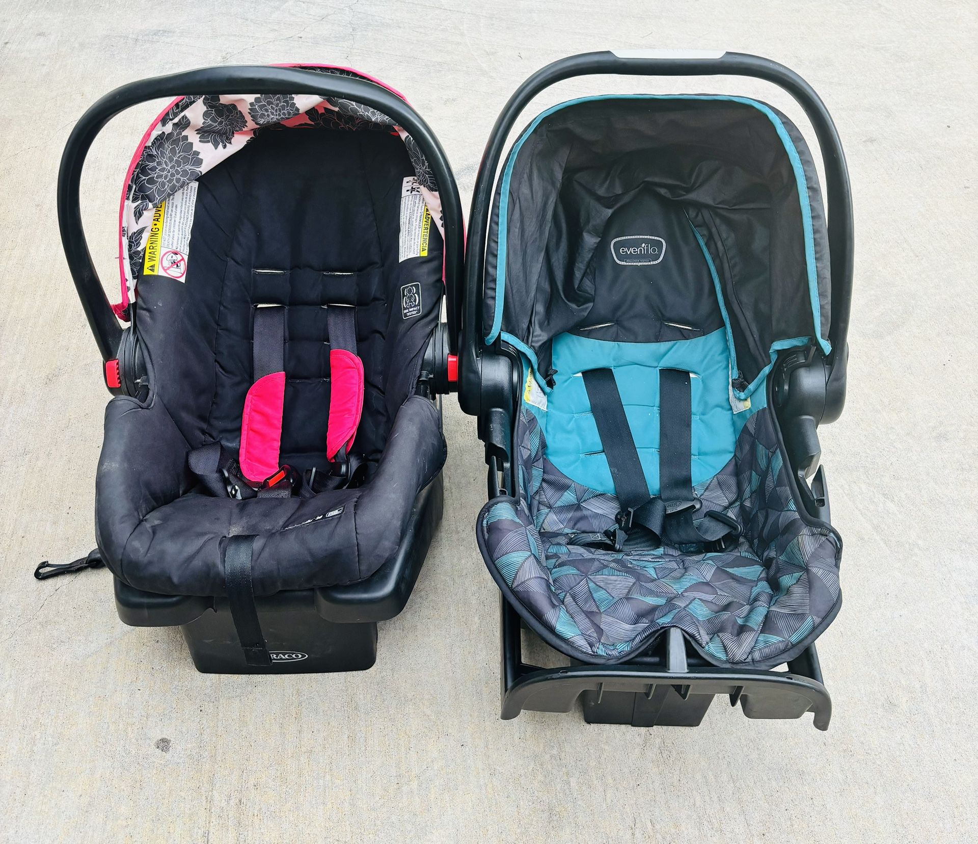 2 baby seats graco and evenflo pink and green