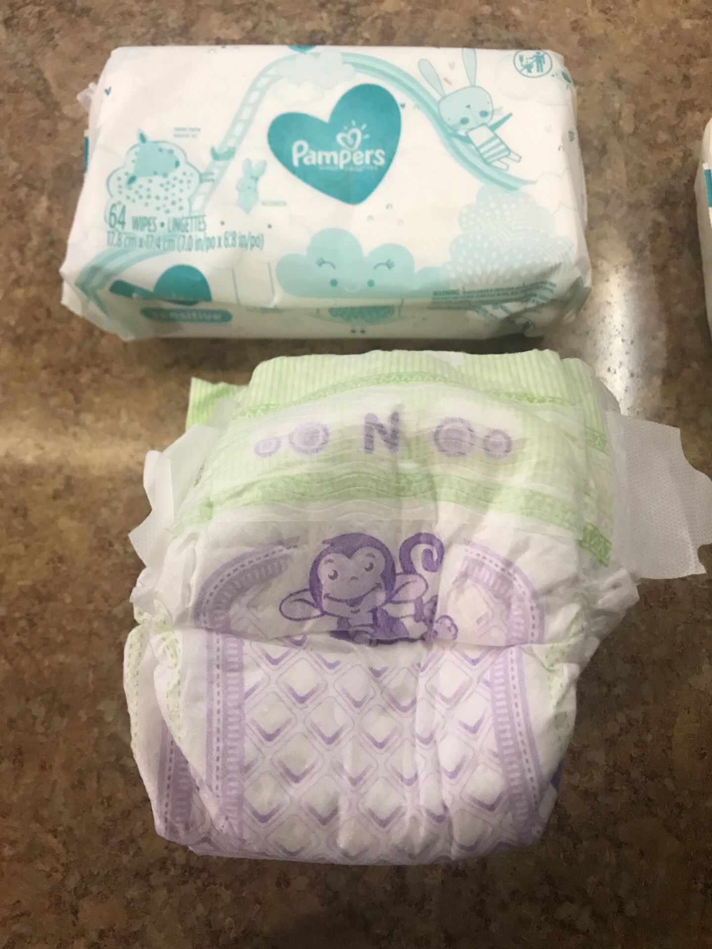 Sensitive pampers wipes and newborn luvs diapers