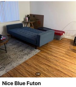 Beautiful blue futon great for sleeping too