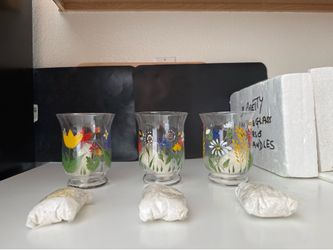 Three pretty glass candle holders