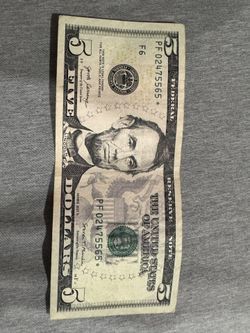 5 dollar bill with a star