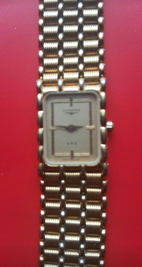 18KT GOLD SWISS DESIGNER WATCH💎