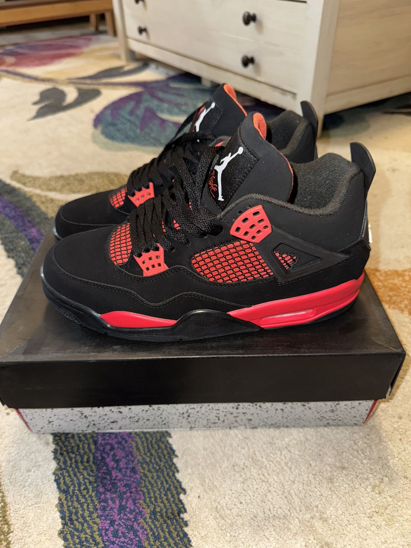 Jordan 4 Red Thunders