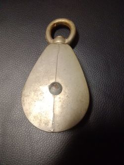 Vintage single -sheave aluminum & bronze block pulley with a fixed eye 4 1/2 inch tall made in Spain.