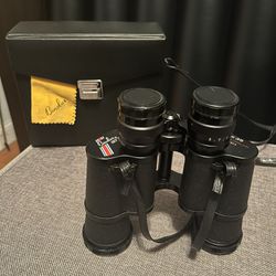 Vtg Binolux 7x35 Binoculars with Leather Case, Covers, Strap, Cleaning Cloth. Brand new. No#08878. 393 feet at 1000 yards. Made in Korea