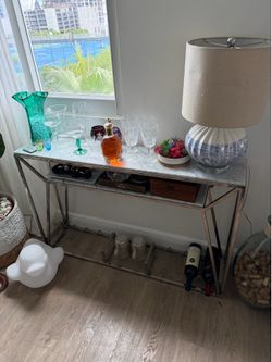 Entry table marble  47 long 30” tall 10” deep