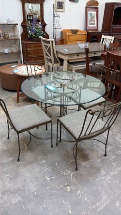 Iron and glass table with chairs