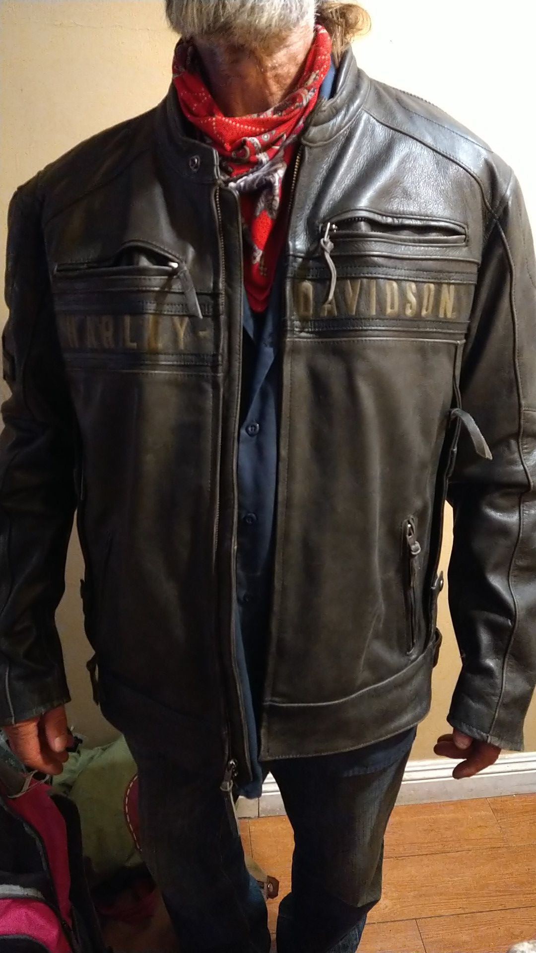 Harley Davidson triple ventilated leather jacket recently conditioned to its original finish .