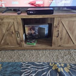 Entertainment center used Doesn't include Xbox. 