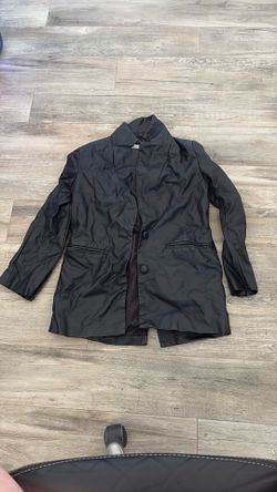 Woman’s size 10 DISSH black leather-look jacket