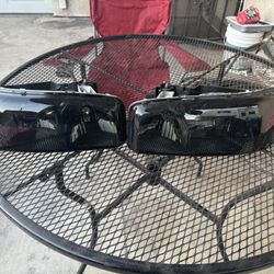 99-06 GMC Sierra/yukon Headlights 