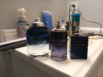Coach blue, sauvage eau de parfum and ysl elixir