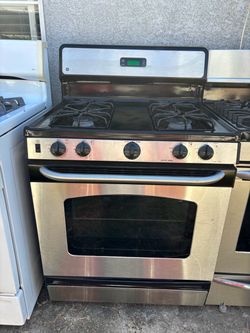 Stainless steel gas stove brand General Electric everything works with a 3 months warranty