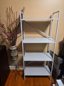 4  shelf metal rack.  Good condition.