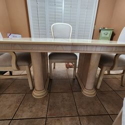 Table with 6 chairs and leaf