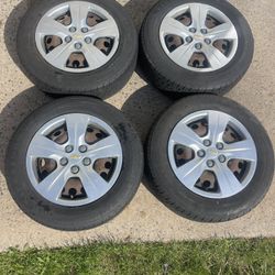 Set of 4 15" wheels, tires, and hubcaps Chevy Cruze.195/65/15