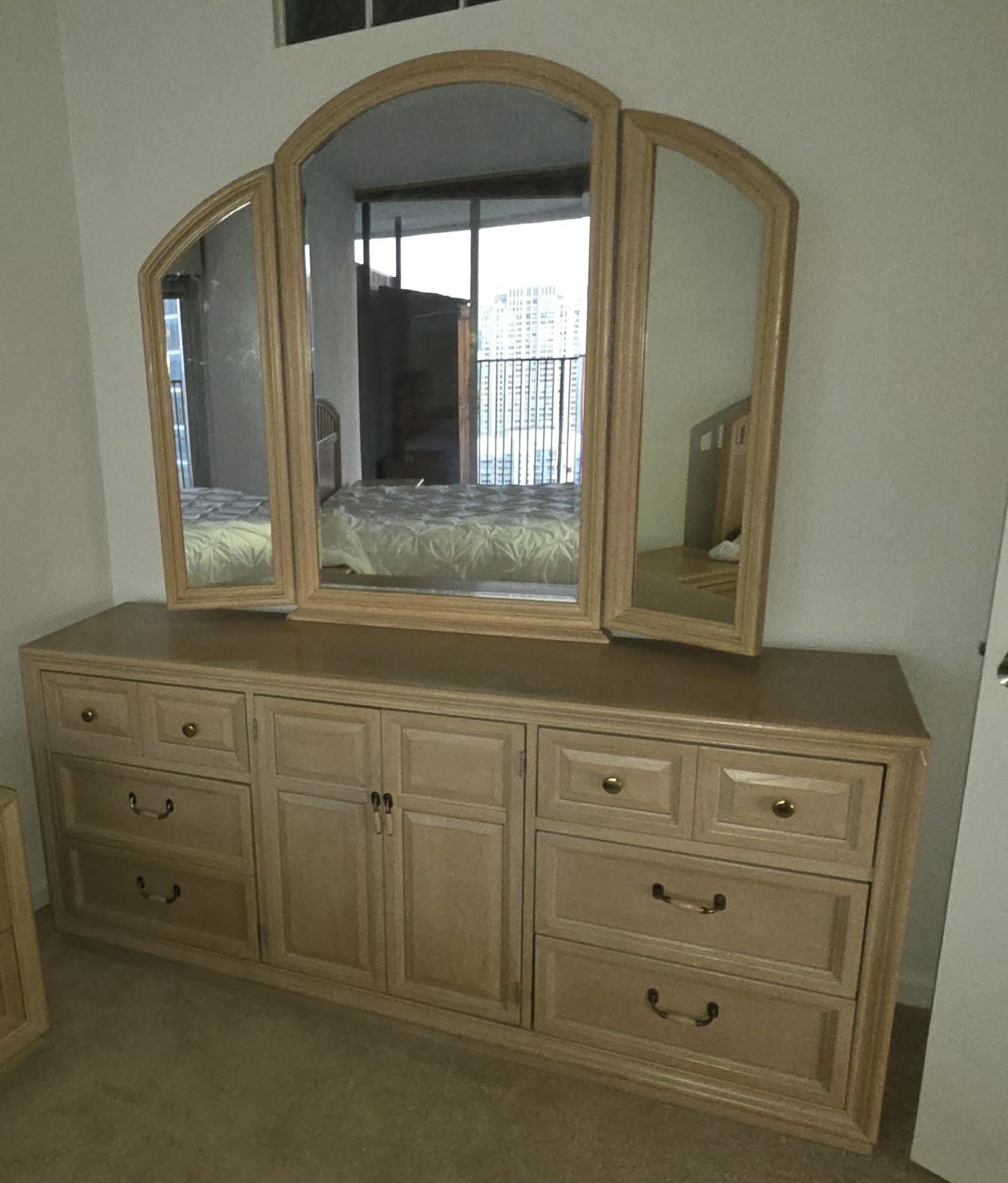 Stanley Furniture washed oak dresser with a tri-fold mirror from the late 20th century.