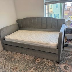 Twin size bed with trundle