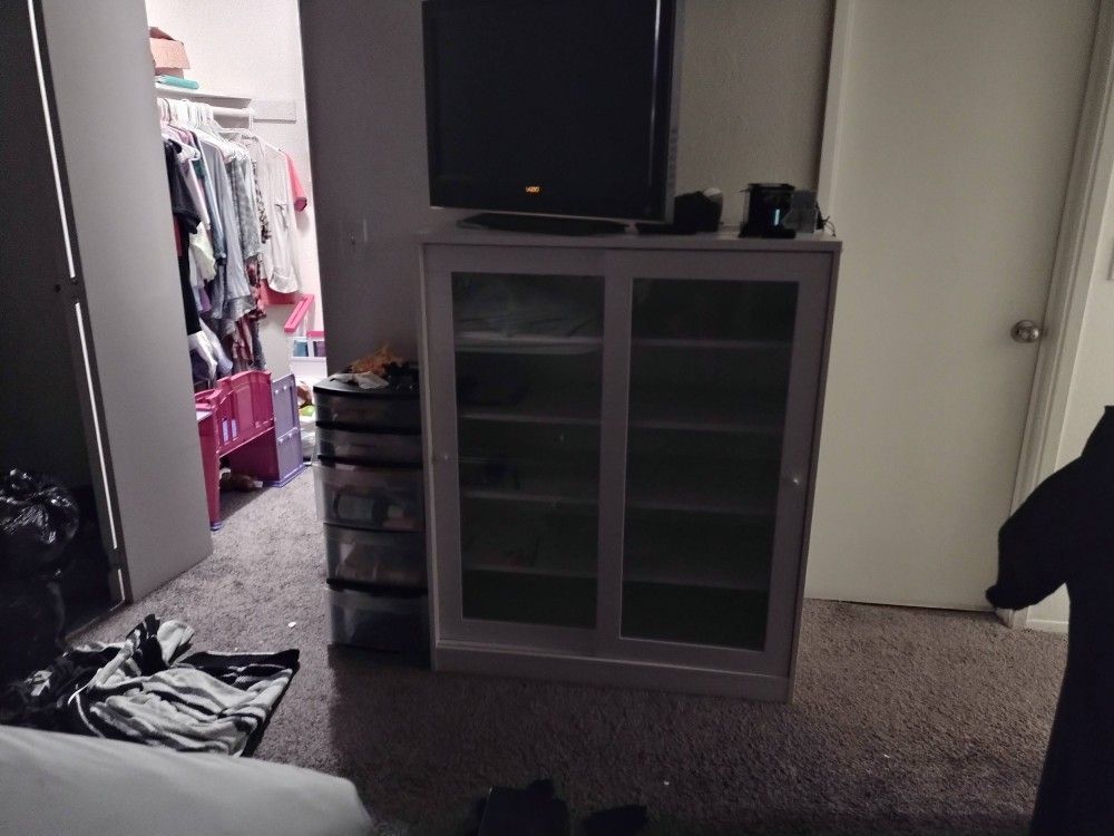 White Sliding Door Shelving Unit