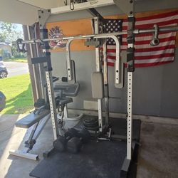 Squat Rack With Pulley System And Olympic Bar. (Sold The 115lb Dbs)