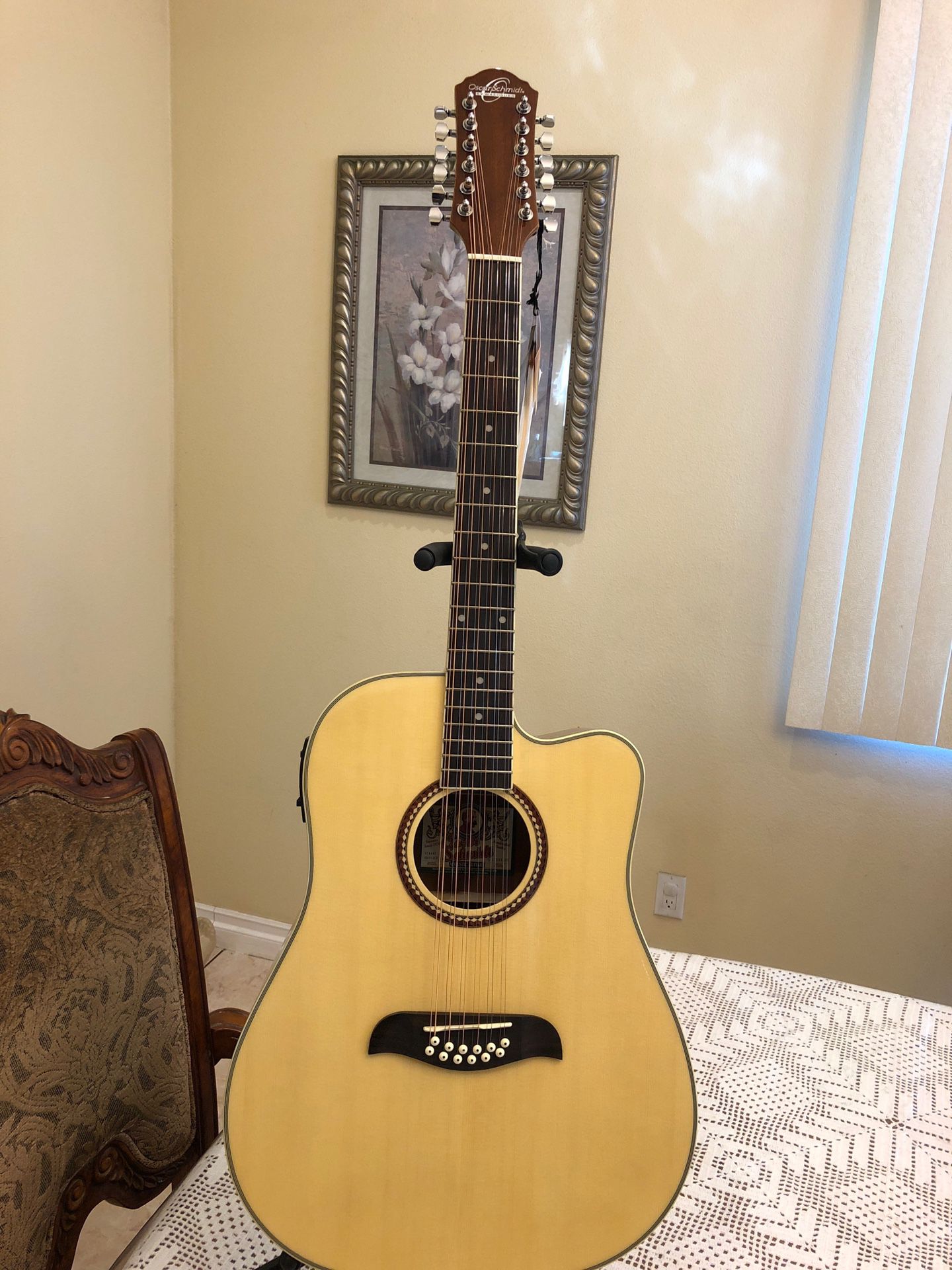 Oscar Schmidt 12 string electric acoustic guitar with built in tuner