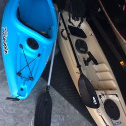 (2) KAYAKS W/paddles. New!!!