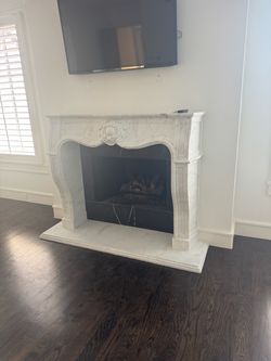 Free white marble fireplace mantle