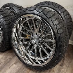 NEW 24x12 mirror chrome fittipaldi wheels wrapped in 285/40r24 RBP tires