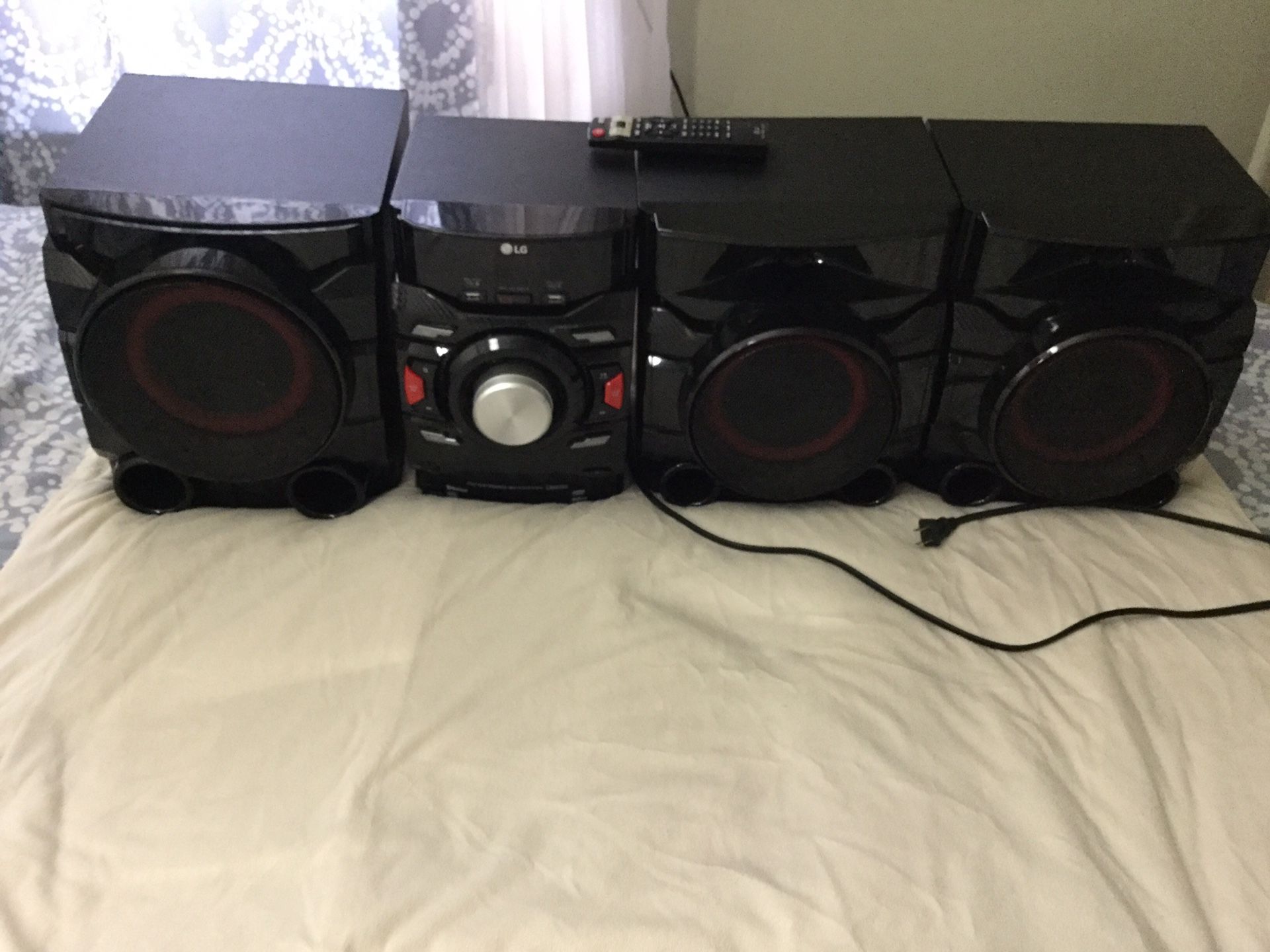LG. Xboom 700W main unit and speaker stereo system combo set.