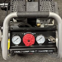 Husky 2 Gal. 135 PSI Portable Electric Oil-Free Quiet Jobsite Air Compressor with Dual Pressure Gauges and 1-Quick Coupler