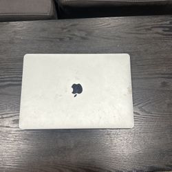 little crack the covers the whole screen other than that mac book 