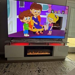 Upgrade your entertainment space with this modern white LED TV stand lighting panel! Perfect for TVs up to 86 inches, it features 80-inch (≈203 cm) mu