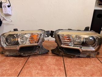 Tacoma OEM headlights