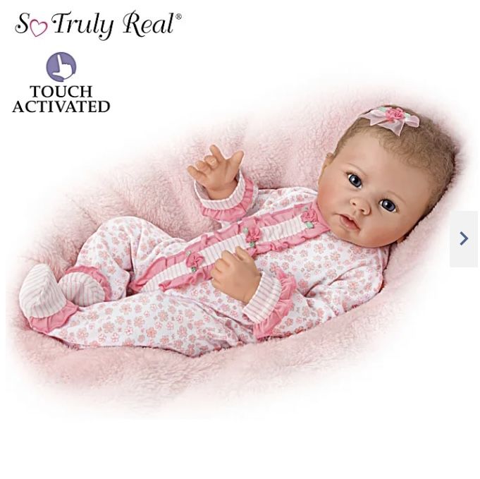 Katie Baby Doll: “Breathes,” “Coos,” and has a “Heartbeat.”