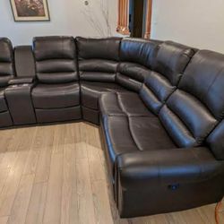 New Reclining Sectional.  Brown Or Black Leather.  111” X 98”.  Free Delivery!