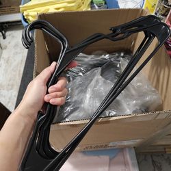Brand new plastic hangers - 50, sturdy and curved edge, doesn't stetch shoulders.