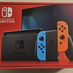 Brand New!! Nintendo Switch W/Neon Red & Blue Joy-cons